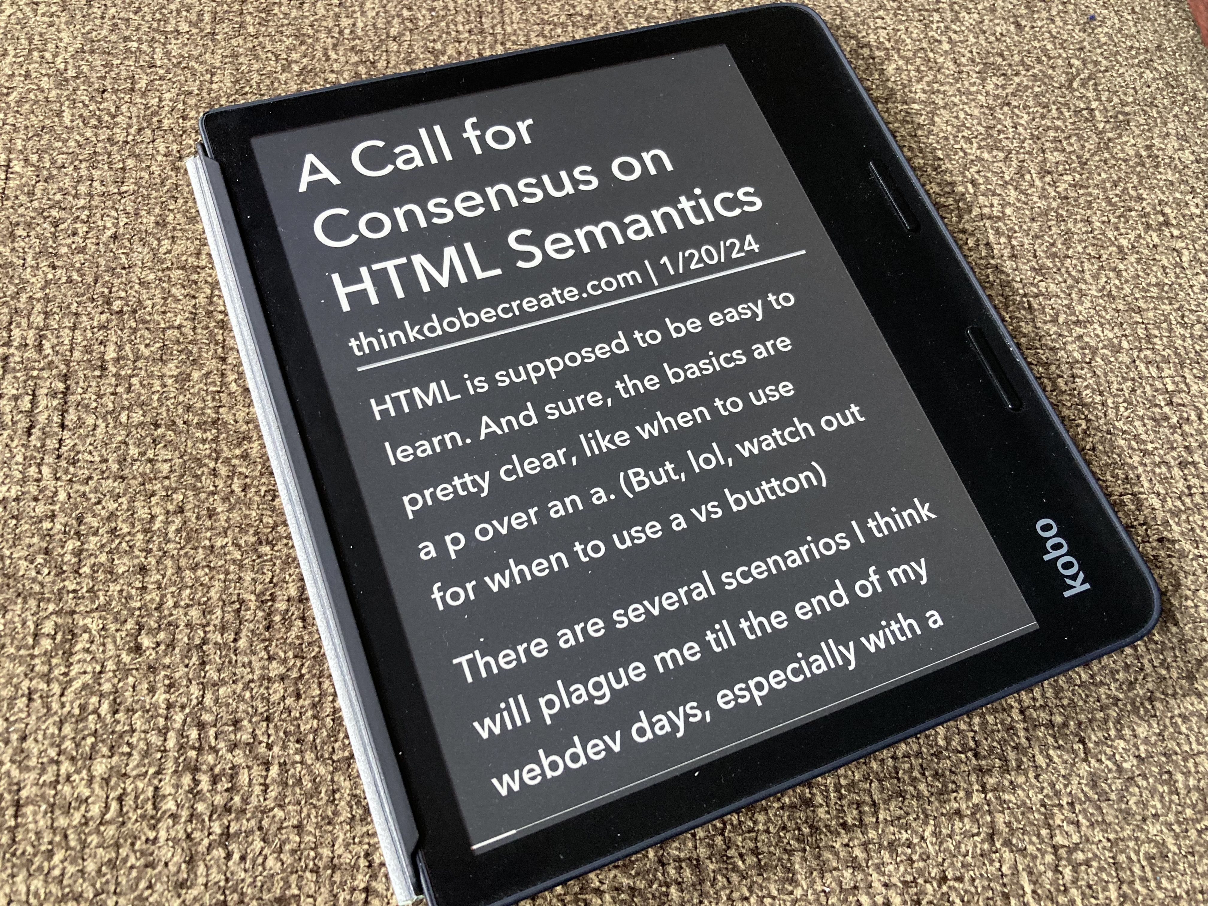Kobo Sage with article on screen: "A Call for Consensus on HTML Semantics" by thinkdobecreate.com on 1/20/24. Large, light sans-serif text on dark background.
